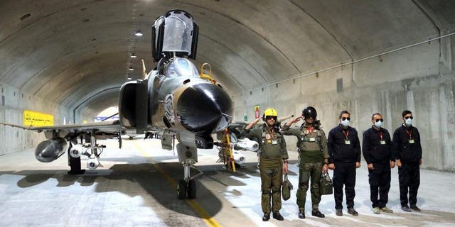 A fighter aircraft is seen at the first underground air force base, called "Eagle 44," at an undisclosed location in Iran. 
