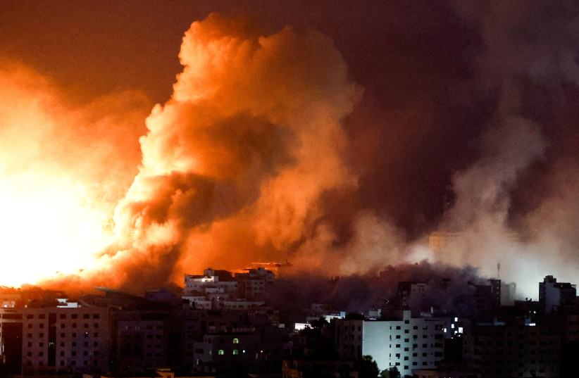  Flames and smoke billow during Israeli strikes in Gaza, October 9, 2023. (credit: REUTERS/MOHAMMED SALEM)