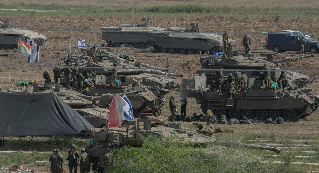  Israeli soldiers seen at a staging area near the southern Israeli border with Gaza, October 14, 2023.  (photo credit: ERIK MARMOR/FLASH90)