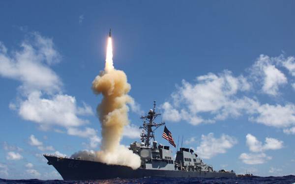 Illustrative: A US Navy destroyer fires a missile. (US Navy photo)